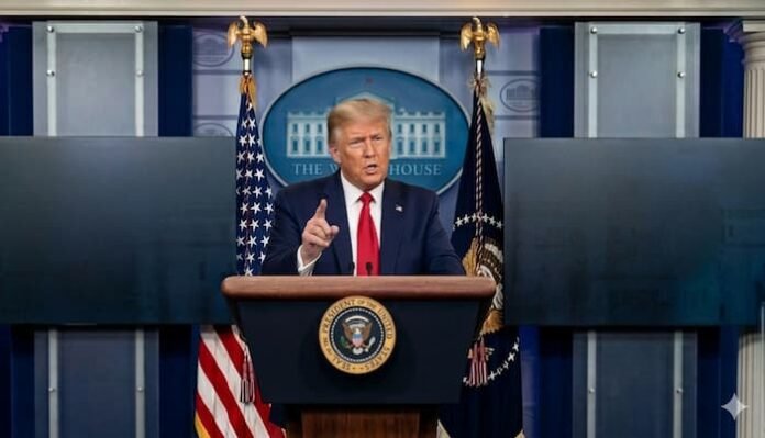 백악관 로고가 새겨진 포디움 뒤에서 오른손 검지를 치켜들며 열변을 토하고 있는 도널드 트럼프 대통령의 모습. 배경에는 대형 스크린과 성조기가 배치되어 있으며, 단호하고 자신감 넘치는 표정으로 이란전 종결 관련 연설을 하는 장면.